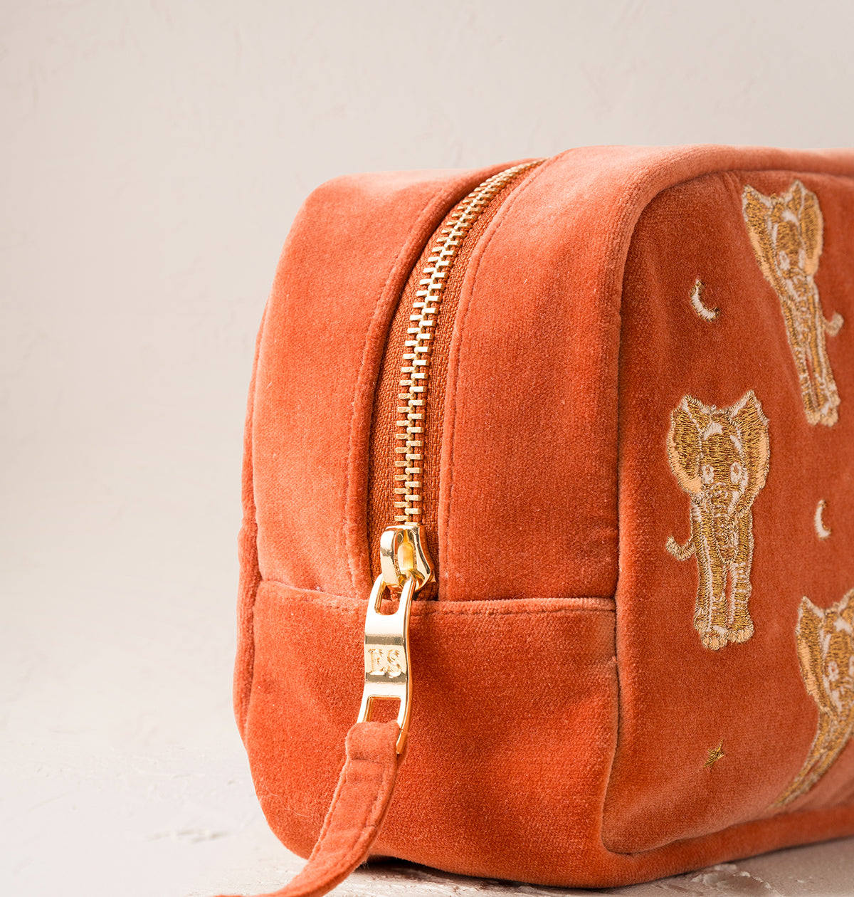 Golden Elephants Makeup Bag in Rust