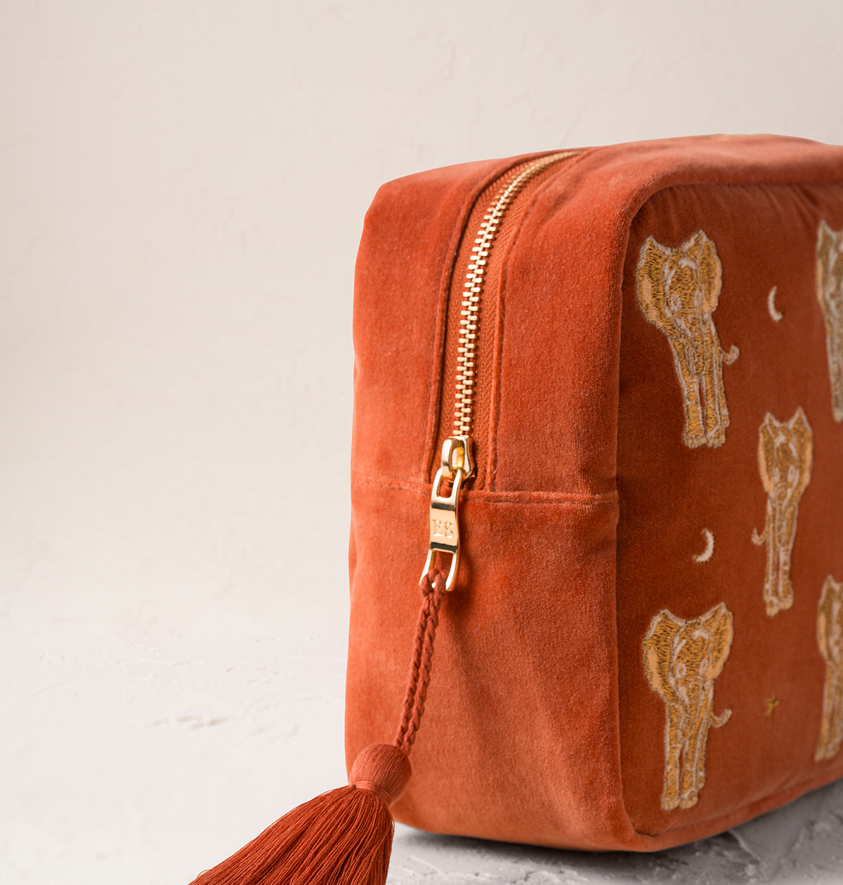 Golden Elephants Wash Bag in Rust