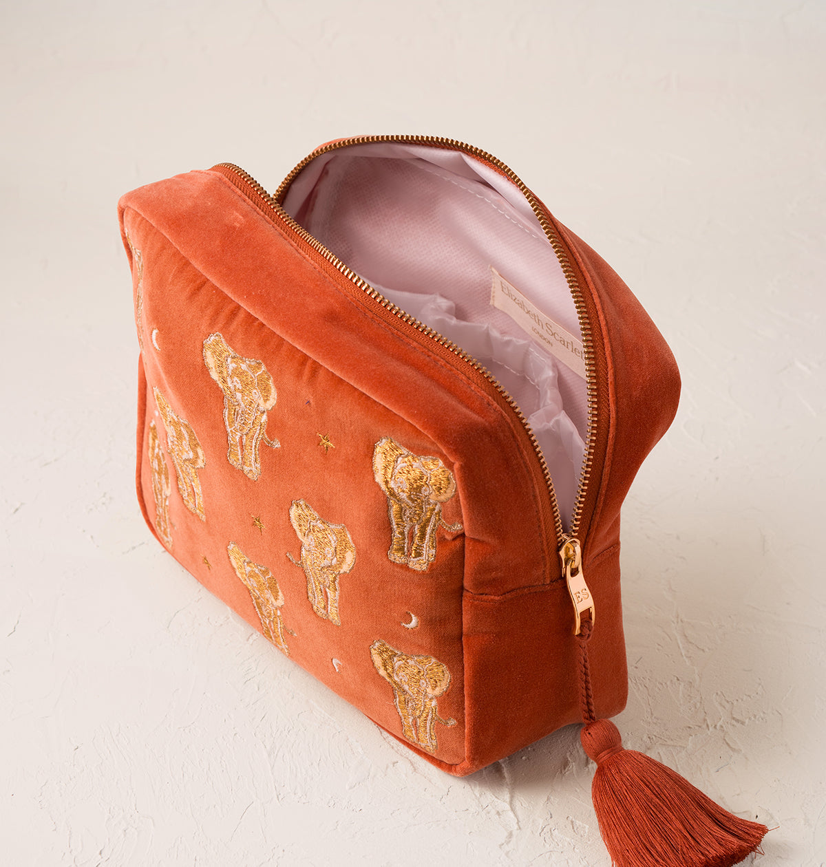 Golden Elephants Wash Bag in Rust