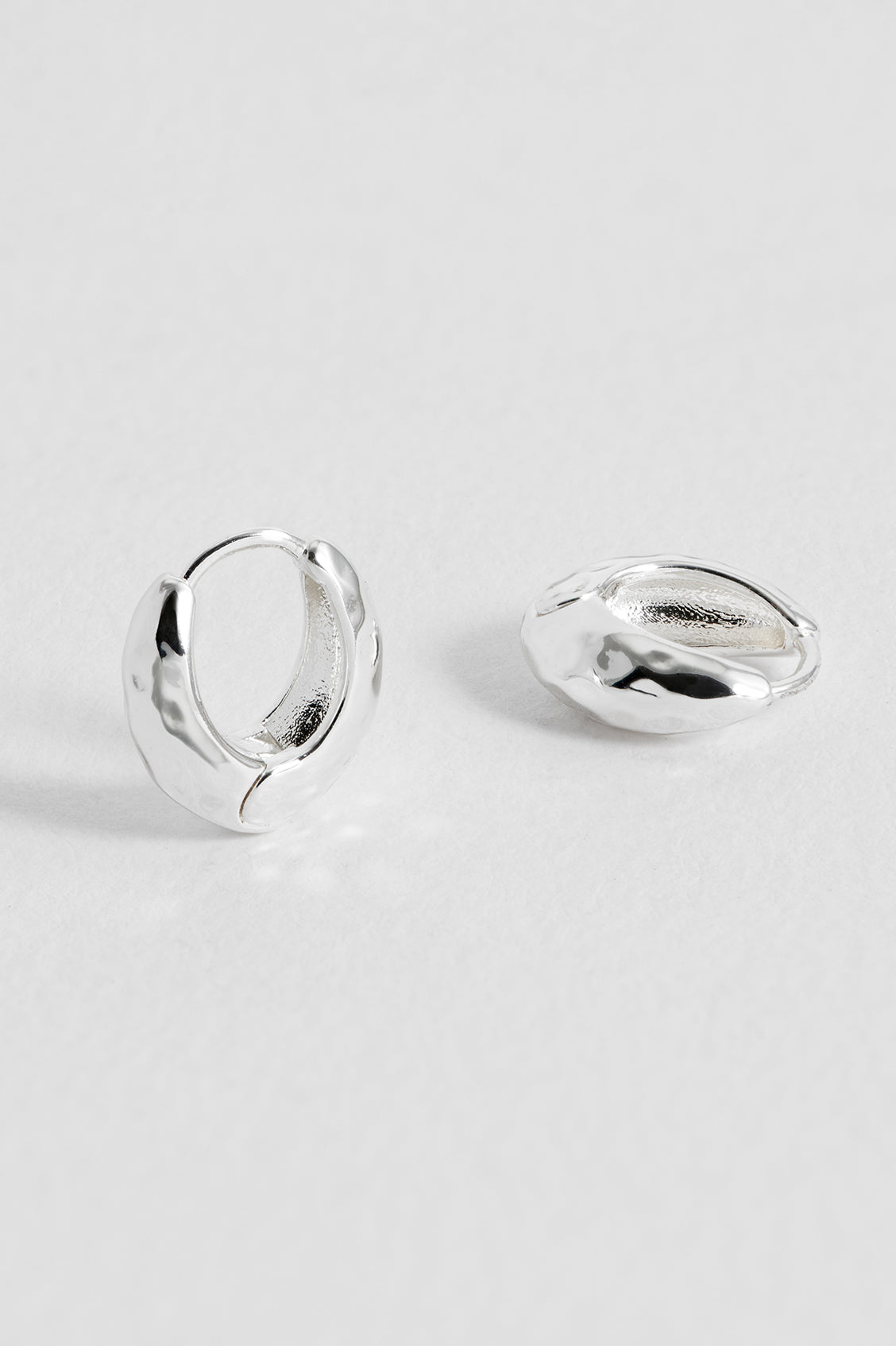 Estella Bartlett Silver Hammered Huggies