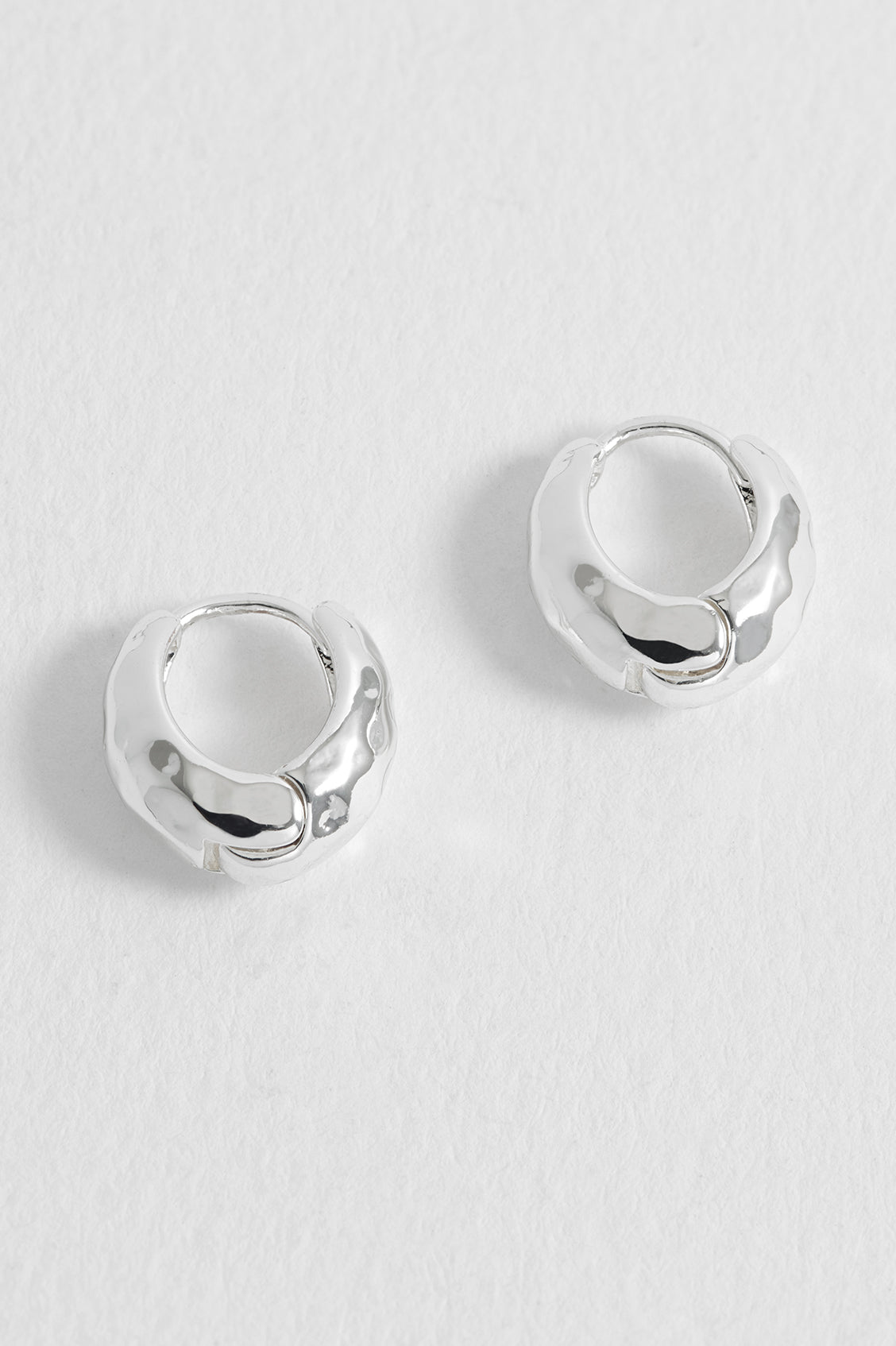 Estella Bartlett Silver Hammered Huggies