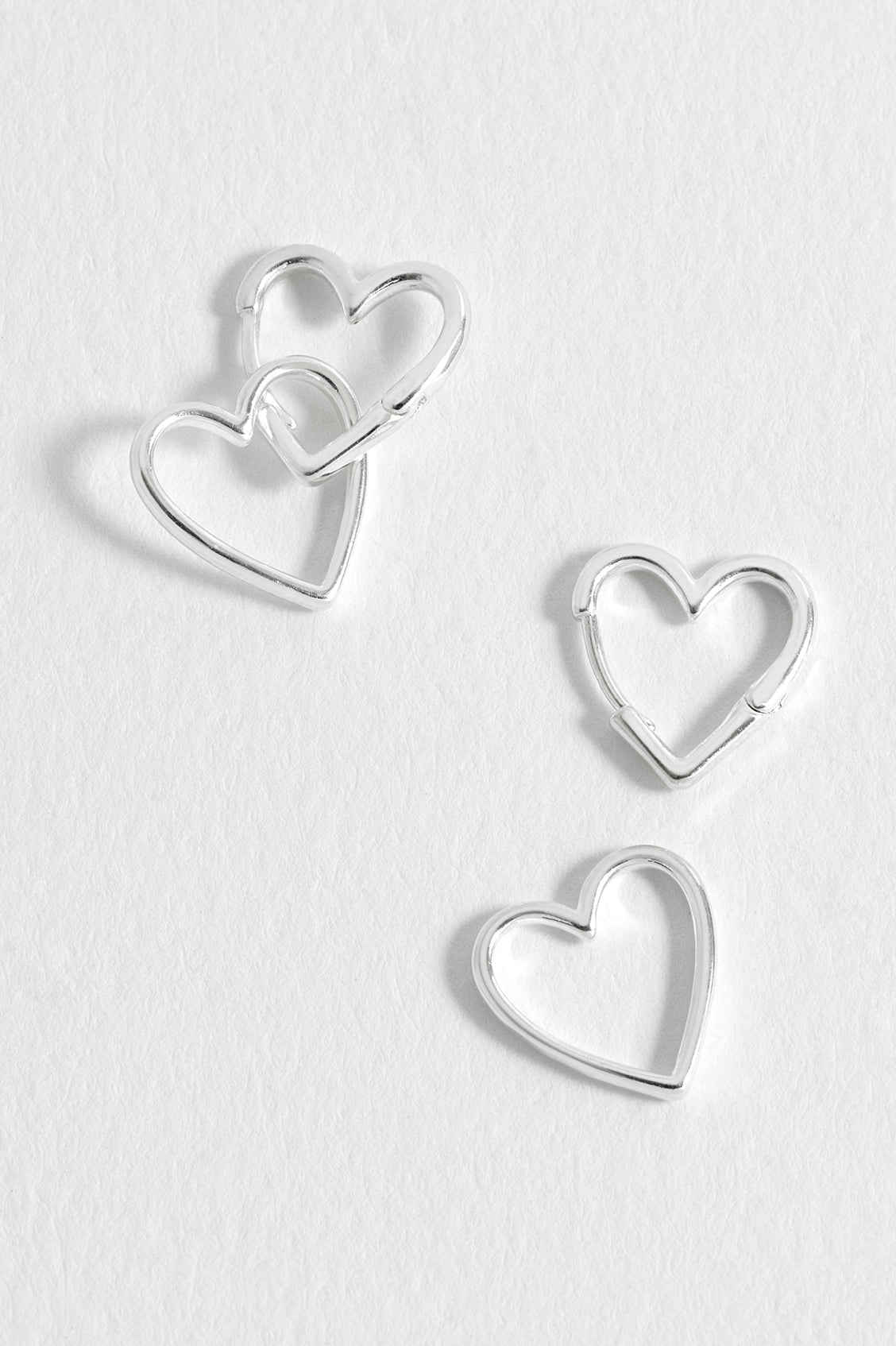 Estella Bartlett Double Heart Hinged Hoop Earrings Silver