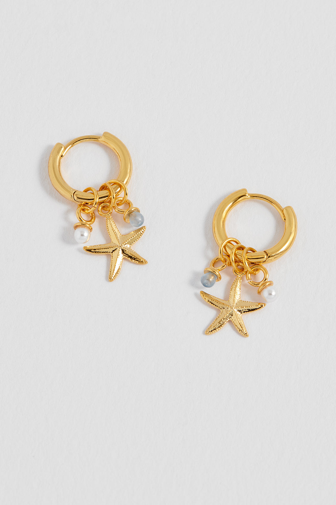 Estella Bartlett Starfish Charm Huggie Hoops