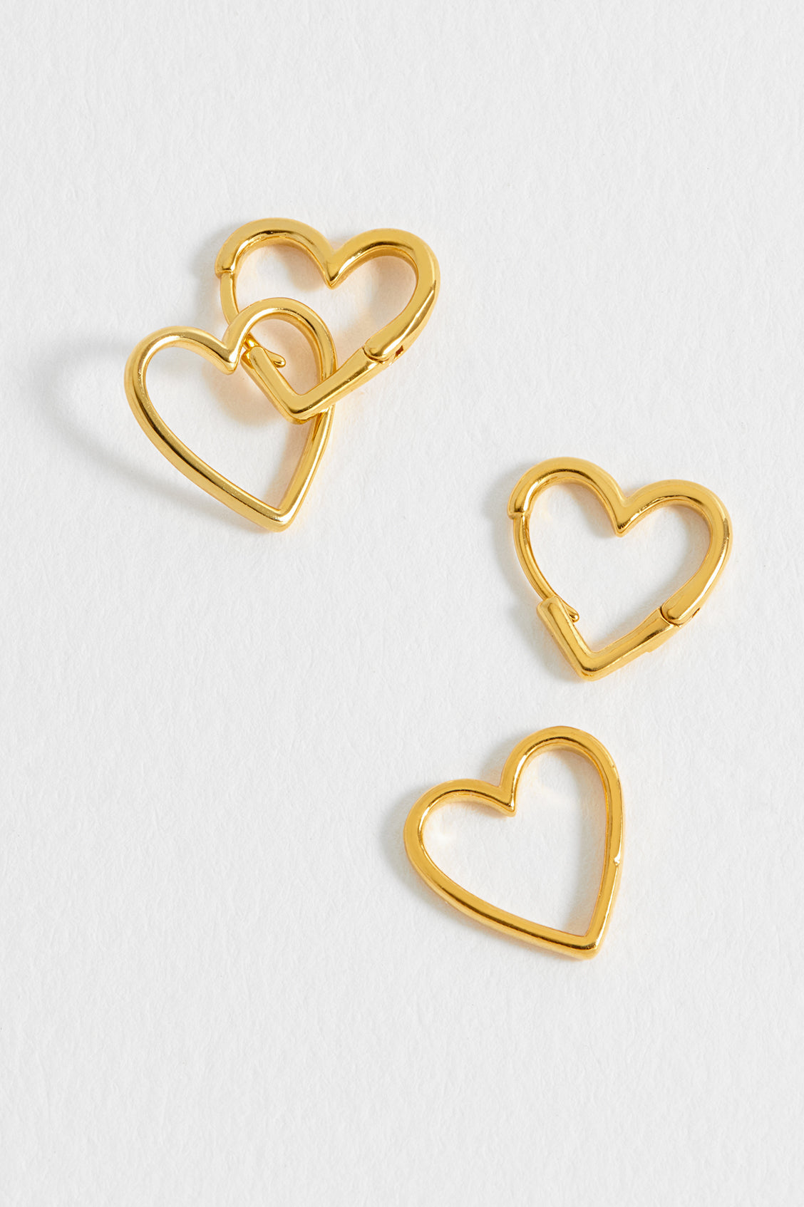 Estella Bartlett Double Heart Hinged Hoop Earrings Gold